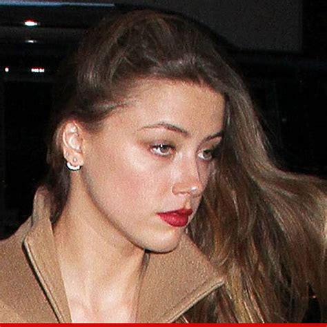 amber heard leaks|Photos leak of Amber Heard making out with mystery。